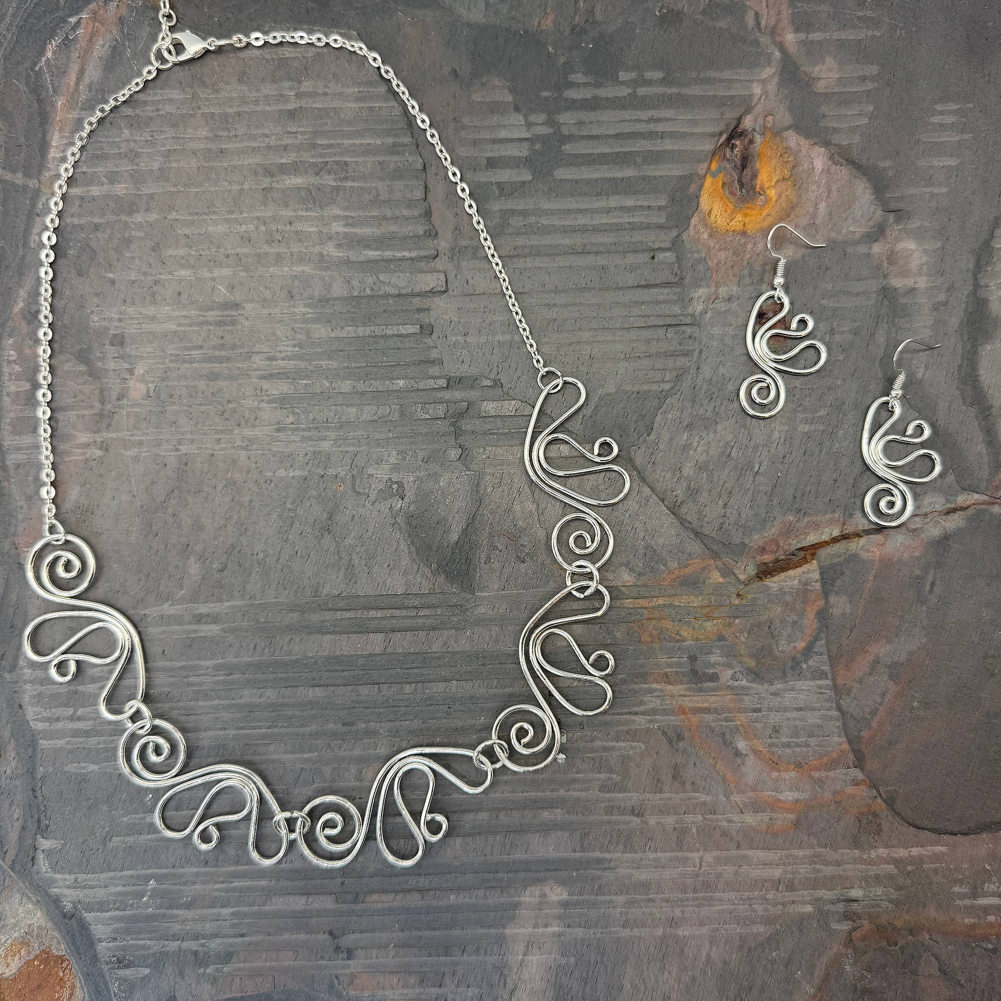 Handcrafted Whimsical Swirl Silver Earrings