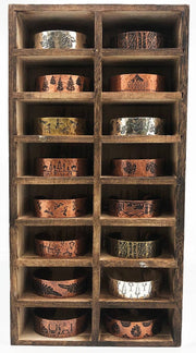 16 Assorted Engraved Metal Cuffs with Wooden Display